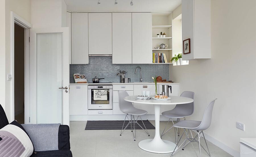 white open kitchen with wall cabinets